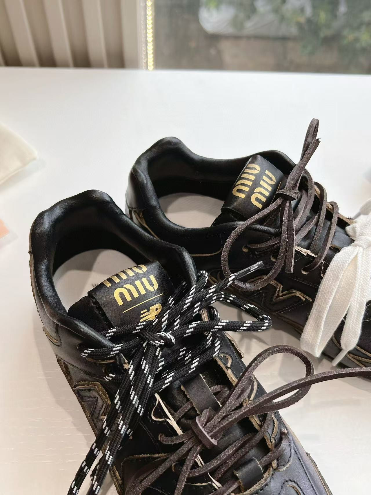 UA Miu Miu x New Balance 530 SL leather sneakers