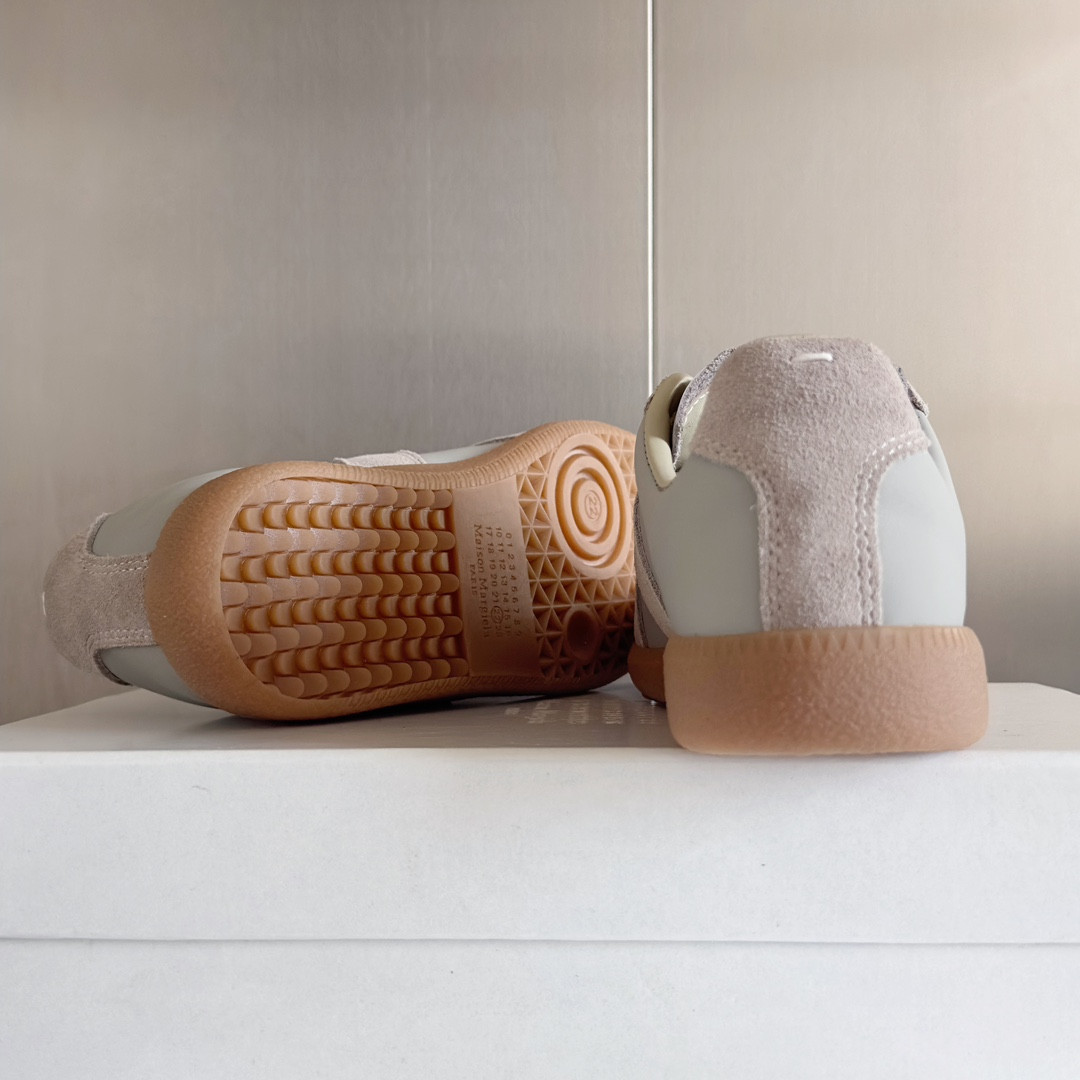 ua ma*s*n Ma*i*la mm6 sneakers