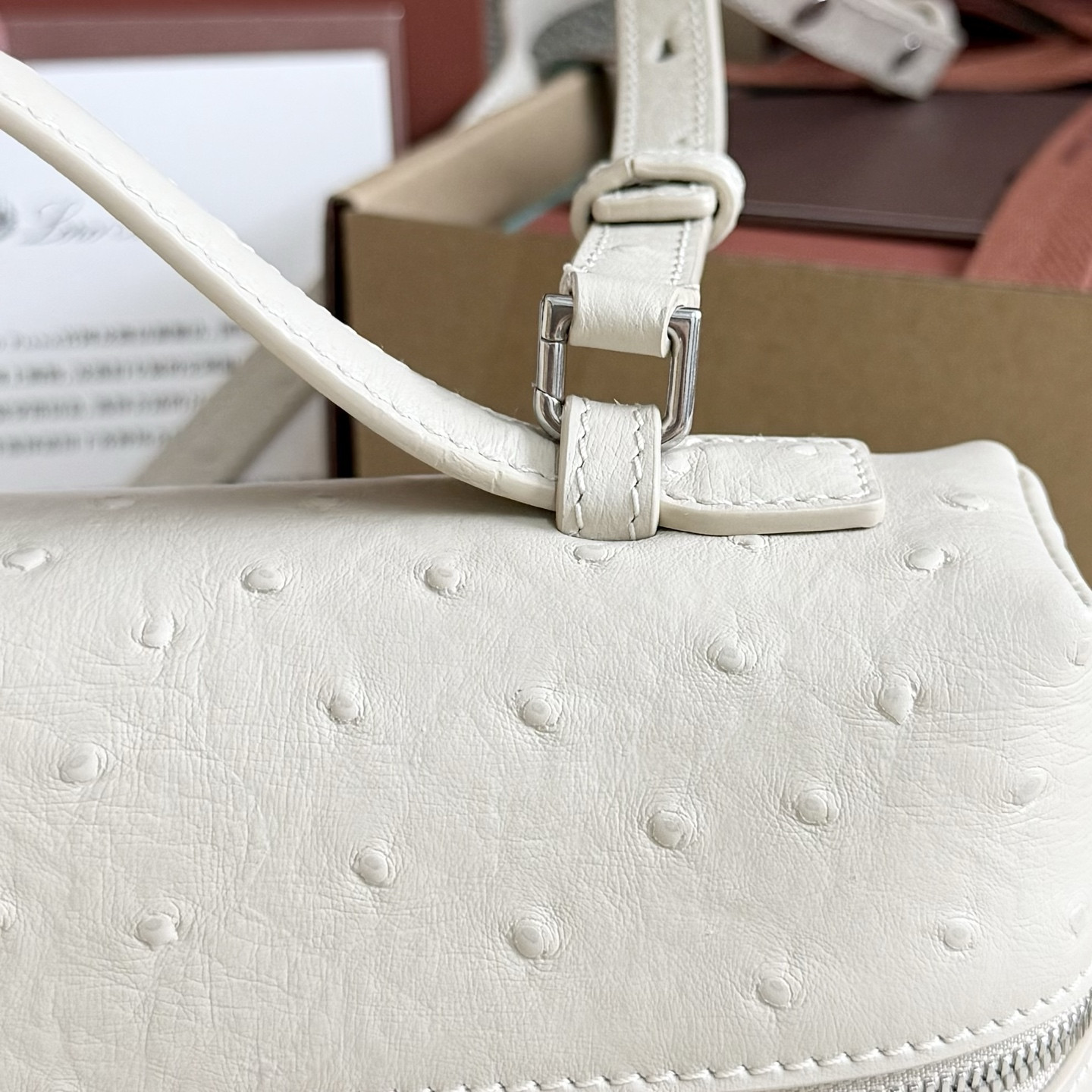 L**o p*ana extra pocket l27 ostrich-grained leather 16x27x10cm